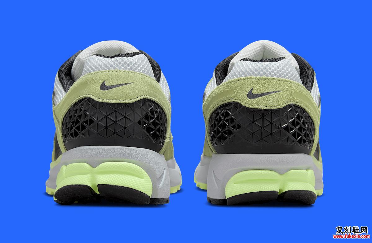 Nike Zoom Vomero 5 Barely Volt 后视图，采用黑色几何鞋跟细节。