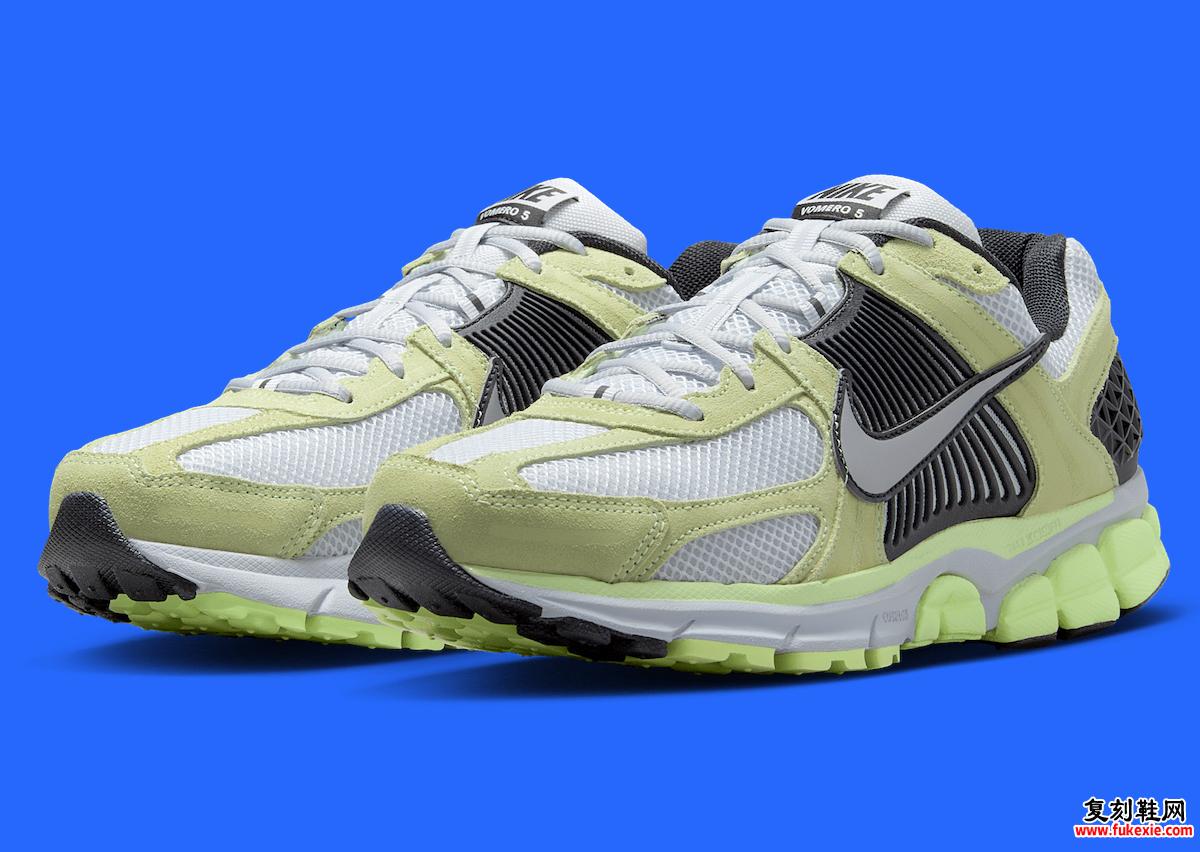 Nike Zoom Vomero 5 Barely Volt 展示了其米白色网眼和绿色绒面革覆层。